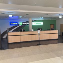 Enterprise Autovermietung Deutschland - Empty Alamo counter at time of agreed pickup after 18 hours of travel leaving us stranded at the Bremen International Airport on Xmas