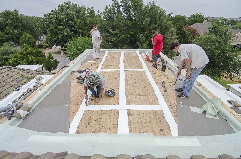 Slide of Freetail Roofing