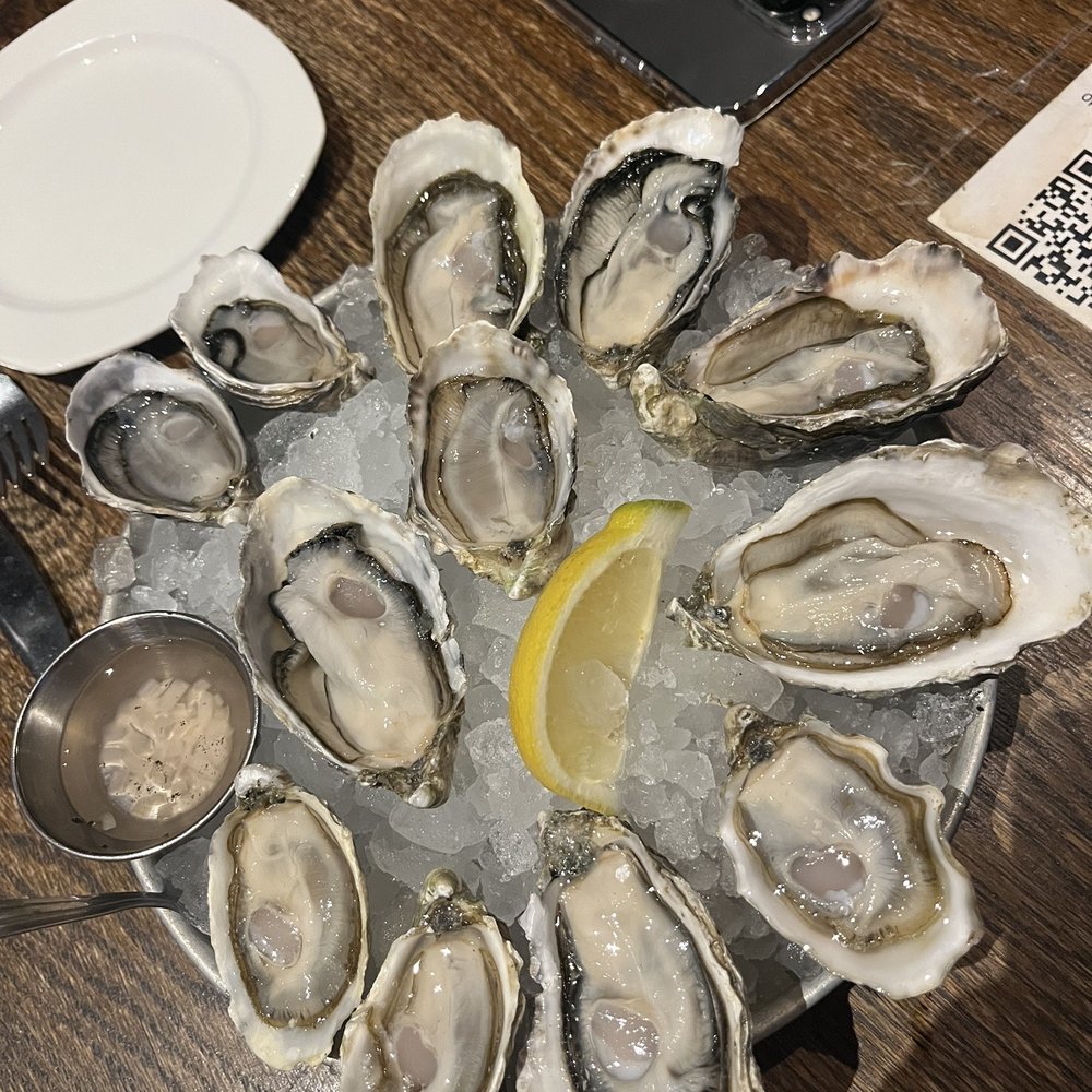 Taylor Shellfish Oyster Bar - We wound up ordering two dozen. $2.25 each - Seafood Near Me - Seattle, Washington Taylor Shellfish Oyster Bar - We wound up ordering two dozen. $2.25 each - Seafood Near Me - Seattle, Washington