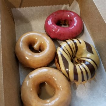 Benny's Donuts - 2 maple,  1 chocolate with peanut butter,  and a Marionberry - Donuts Near Me - Corvallis, Oregon