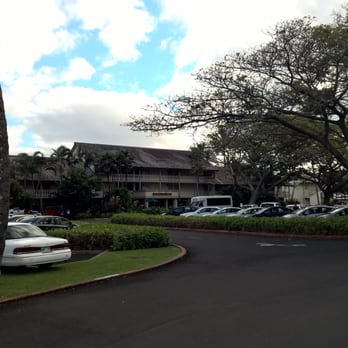 Aston Islander on the Beach - The parking lot an view of the front. - Resorts Near Me - Kapaa, Hawaii
