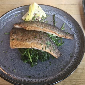 Restaurant Brücke - Loup de Mer mit Blattspinat und Röstkartoffeln. - Seafood Near Me - Wangerland, NI Restaurant Brücke - Loup de Mer mit Blattspinat und Röstkartoffeln. - Seafood Near Me - Wangerland, NI