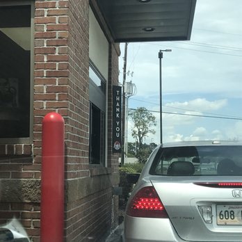 Wendy's - a silver car parked in front of a restaurant - Burgers Near Me - Zachary, Louisiana