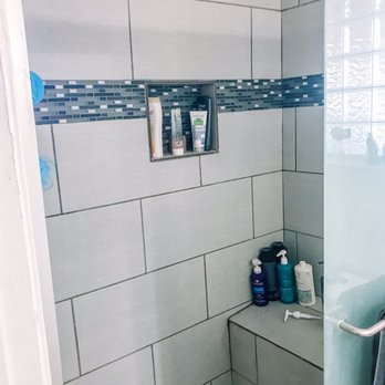 Honey Do - a shower with a glass door - Landscaping Near Me