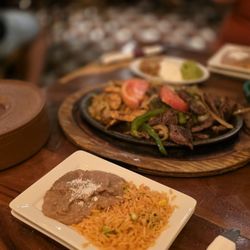 Cancun Grill - Steak and Chicken fajitas for two with rice and beans and flour tortillas