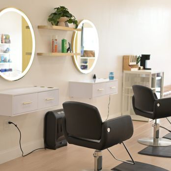 Buzz Cuts Kids Salon - The inside of the salon, showing off a clean, bright space with modern salon chairs and stylish oval mirrors. - Kids Hair Salons Near Me - Plano, Texas Buzz Cuts Kids Salon - The inside of the salon, showing off a clean, bright space with modern salon chairs and stylish oval mirrors. - Kids Hair Salons Near Me - Plano, Texas