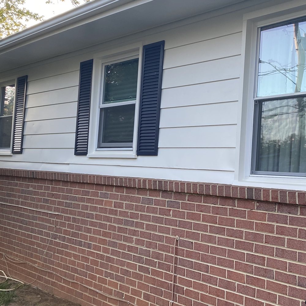 Cp Services - Front of the house with before and after shutting painted. New is the Charcoal blue and old is black. - Painters Near Me Cp Services - Front of the house with before and after shutting painted. New is the Charcoal blue and old is black. - Painters Near Me