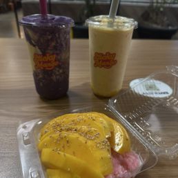 Mango Sticky Mango + Sticky Mango Smoothie - Classic 20oz + sticky mango smoothie Sticky Mango Smoothie - Ube 20oz Mango Sticky Mango + Sticky Mango Smoothie - Classic 20oz + sticky mango smoothie Sticky Mango Smoothie - Ube 20oz