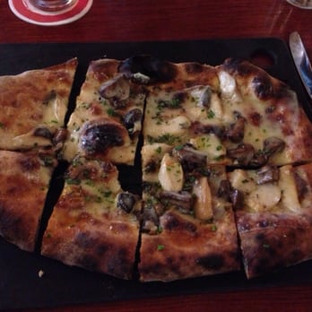 Serious Pie Downtown - Seasonal mushroom and truffle cheese pizza - Pizza Near Me - Seattle, Washington Serious Pie Downtown - Seasonal mushroom and truffle cheese pizza - Pizza Near Me - Seattle, Washington