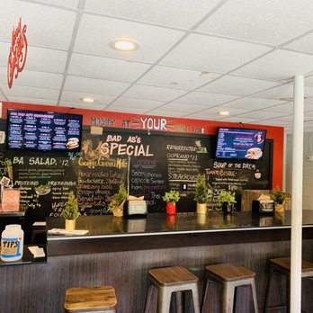Bad As's Sandwich - The menu TVs and wall show the variety of options. - Sandwiches Near Me - Orlando, Florida