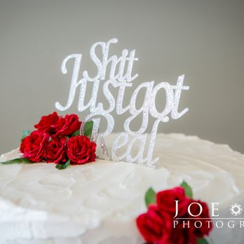 Mario's Bakery - a wedding cake with red roses - Bakeries Near Me - Syracuse, New York