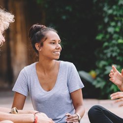 Hillsboro Medical Center Women's Health Clinic - Photo of three people sitting in a circle and talking.