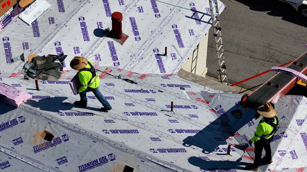 Slide of Symplify Roofing