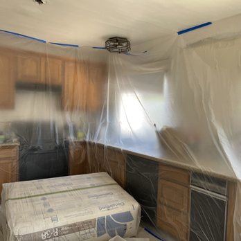 Attic Guys - Prepped and ready to remove old insulation from attic - Pest Control Near Me - Anaheim, California