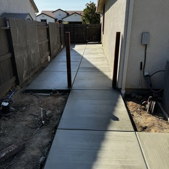 Total Landscape Concepts - New concrete and posts for the fence and gate. - Landscaping Near Me Total Landscape Concepts - New concrete and posts for the fence and gate. - Landscaping Near Me