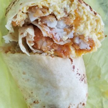 Egg Tuck - The eggcellent burrito with scrambled eggs, crispy tater tots, house sriracha aioli, served in a flour tortilla. Yummy! - Breakfast & Brunch Near Me - Los Angeles, California