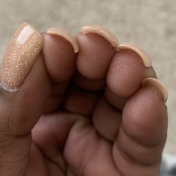 Silk Nails and Spa - The Middle Finger is the nail fixed by a different tech and is sufficiently thicker then the rest of the nails from the original set . - Nail Salons Near Me - Carrollton, Texas