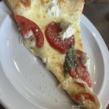 DeRussos Pizzeria - The "White" Pizza slice, perfect crust thickness - Pizza Near Me - St. Petersburg, Florida