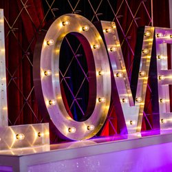 Touch of Jewel Events & Designs - Rent out our LOVE sign to use as a backdrop for your head table, gift table, cake table or on your bar.