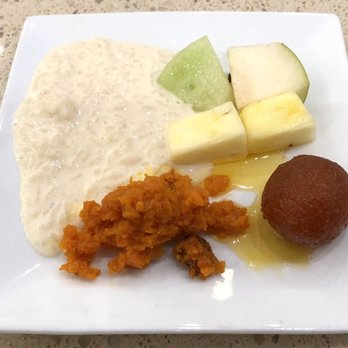 Spice N Rice - A Few Lunch Dessert Buffet Items (Clockwise from Lower Left - Carrot Halwa, Rice Pudding, Fresh Fruits, and Gulab Juman) - All Delish! - Indian Near Me - Overland Park, Kansas Spice N Rice - A Few Lunch Dessert Buffet Items (Clockwise from Lower Left - Carrot Halwa, Rice Pudding, Fresh Fruits, and Gulab Juman) - All Delish! - Indian Near Me - Overland Park, Kansas