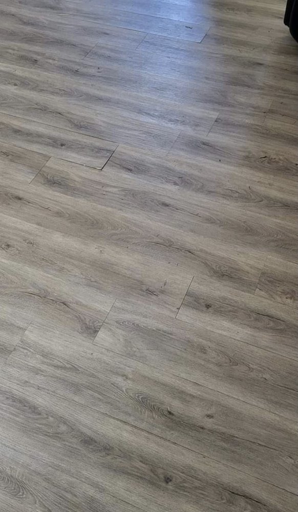 Slide of Equis Roofing