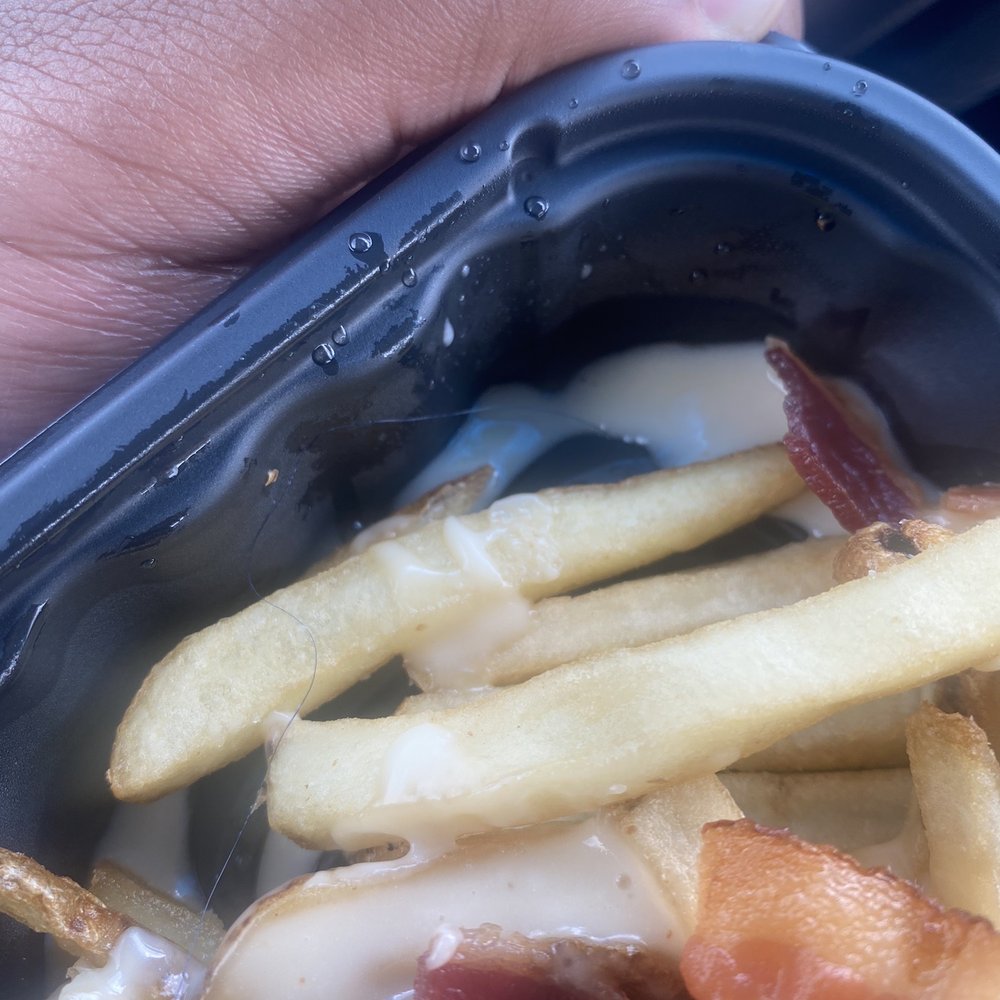 Wendy's - Found this long hair in my pub fries went to complain they made me wait 10 minutes for a refund - Fast Food Near Me - Elmont, New York Wendy's - Found this long hair in my pub fries went to complain they made me wait 10 minutes for a refund - Fast Food Near Me - Elmont, New York