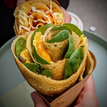 Align Coffee/Crepe Master - a person holding a tortilla - Creperies Near Me - Brooklyn, New York