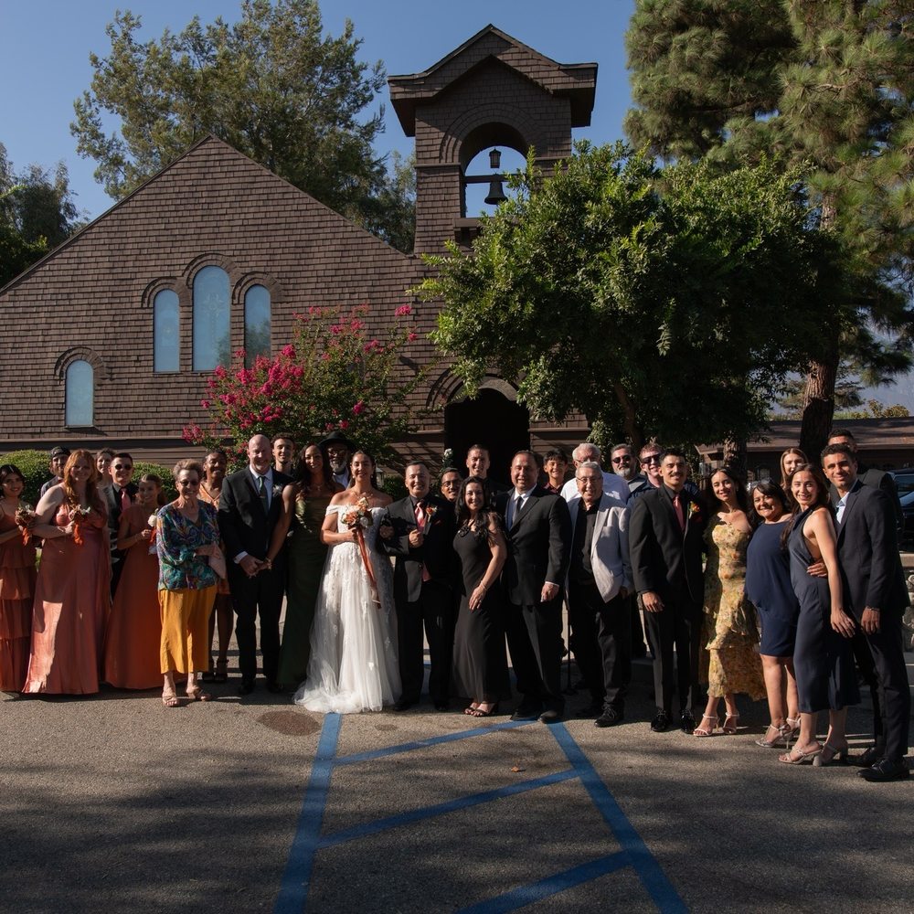 Fleur de Lis Chapel - Family/wedding party photo out in front of the chapel - Venues & Event Spaces Near Me - Upland, California