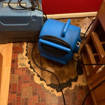 Quick Dry Restoration - Several layers of flooring had to be processed, including the 1964 red linoleum, which was soaking wet. - Damage Restoration Near Me - Nampa, Idaho Quick Dry Restoration - Several layers of flooring had to be processed, including the 1964 red linoleum, which was soaking wet. - Damage Restoration Near Me - Nampa, Idaho