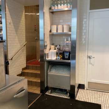 Cipollini Pronto - a kitchen with a sink and a coffee maker - Pizza Near Me - Manhasset, New York