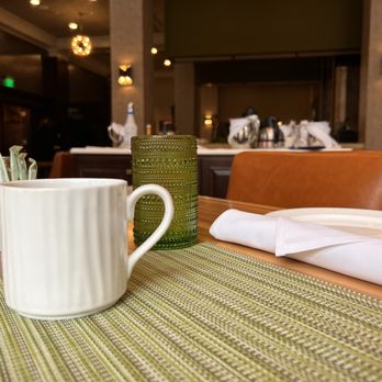 The Walnut Room - a cup of coffee on the table - Breakfast & Brunch Near Me - Green Bay, Wisconsin The Walnut Room - a cup of coffee on the table - Breakfast & Brunch Near Me - Green Bay, Wisconsin