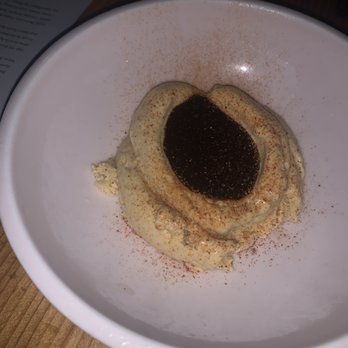 Emmer & Rye - garlic ice cream topped with chocolate syrup - Tapas/Small Plates Near Me - Austin, Texas