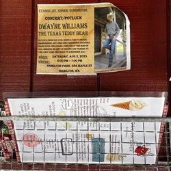 Birdsview Diner - Menu basket out front along with an ad for a local upcoming concert