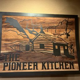 a picture of a wooden sign