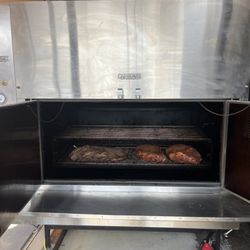 Slicen Dyson Smoked Meats - Our Ole Hickory smoker with a brisket and two pork butts. This thing can hold 40 briskets max
