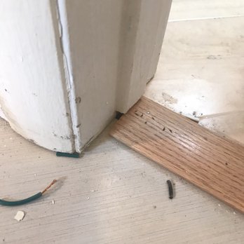 All Your Home Services - a piece of wood on the floor - Flooring Near Me