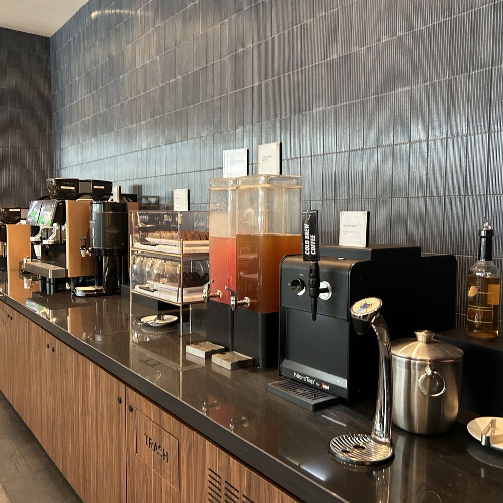 Self served coffee, tea, juice, and water