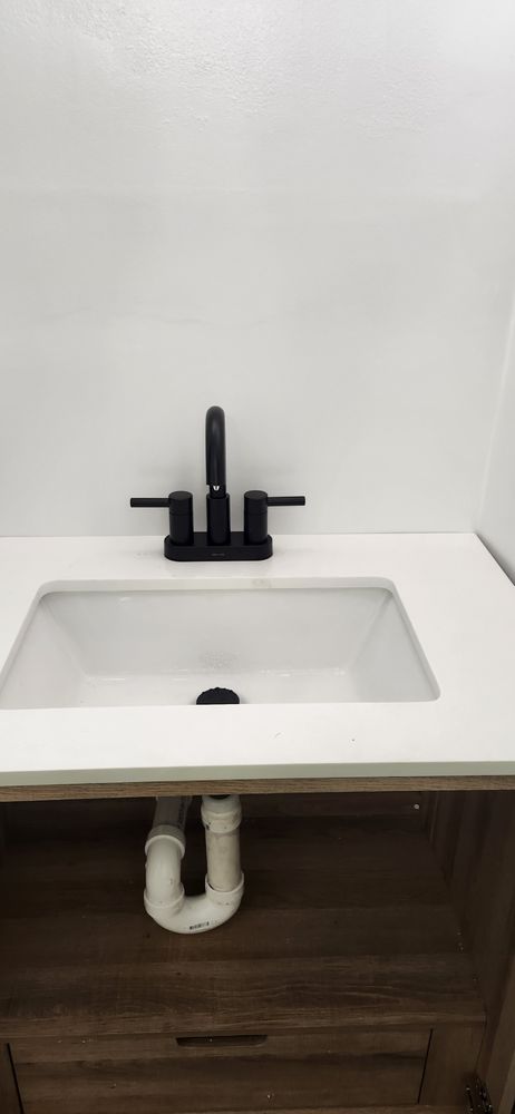 Slide of John's Drain Cleaning and Plumbing Services