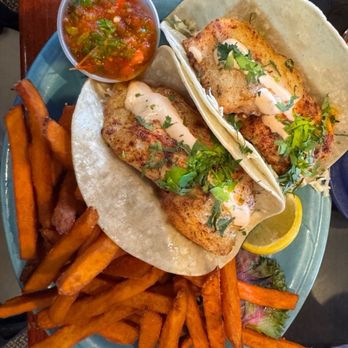 Wally's Chowder House & Broiler - Fresh blackened Halibut Tacos in corn tortillas. Sweet potato fries - Seafood Near Me - Des Moines, Washington Wally's Chowder House & Broiler - Fresh blackened Halibut Tacos in corn tortillas. Sweet potato fries - Seafood Near Me - Des Moines, Washington