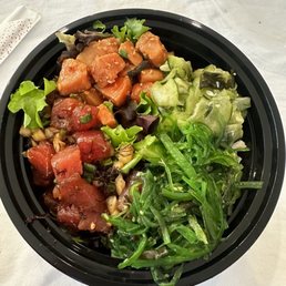 Poke bowl with rice/ salad, pickle cucumbers, ocean salad & ponzu salmon & onion limu ahi
