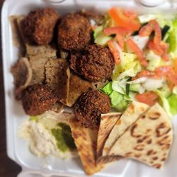 Gyro Hero - Pick 4 combo with gyro, salad, hummus and falafel.