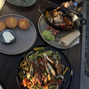 Flecha Cantina - Chicken fajitas and fajita tequila pasta and cornbread - Mexican Near Me - Newport Beach, California Flecha Cantina - Chicken fajitas and fajita tequila pasta and cornbread - Mexican Near Me - Newport Beach, California
