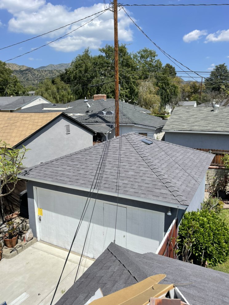 Slide of New Village Roofing