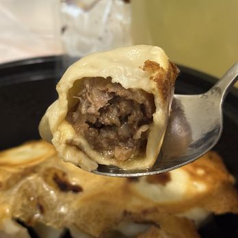 Bee Dumpling - Beef and scallion potstickers; lots of meat and good flavor - Chinese Near Me - Austin, Texas Bee Dumpling - Beef and scallion potstickers; lots of meat and good flavor - Chinese Near Me - Austin, Texas