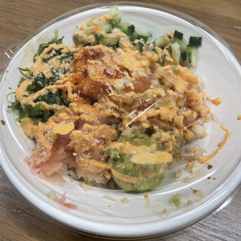 Poké Cleveland - salmon bowl with brown rice cucumber, and fire roasted corn and avocado - Poke Near Me - Highland Heights, Ohio Poké Cleveland - salmon bowl with brown rice cucumber, and fire roasted corn and avocado - Poke Near Me - Highland Heights, Ohio