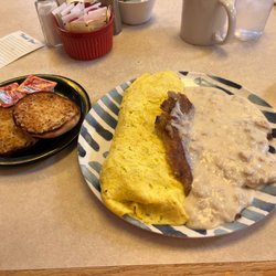 The Apple Dumplin' - Loaded omelette with fried potatoes and sausage gravy.