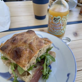 Oat Bakery Goleta - Ham sandwich and tangerine probiotic drink - Bakeries Near Me - Goleta, California