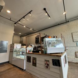 LJ’S Creations Cafe - A wide angle of our display cases and checkout counter