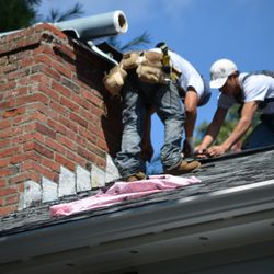 O'LYN Roofing - O'LYN Roofing contractors performing roof repairs and chimney flashing repairs