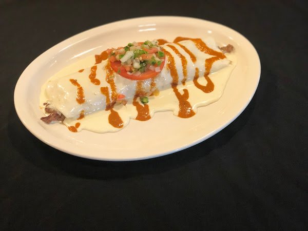 El Mariachi Mexican Grill Logo